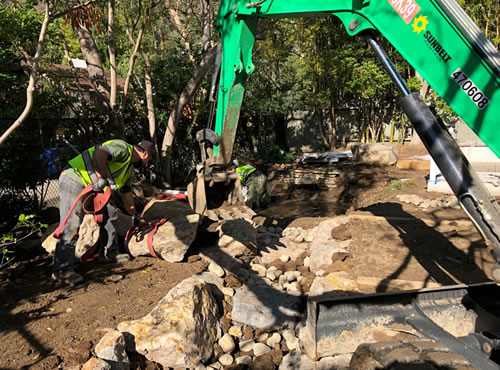 Here we see heavy equipment used to create the bypass stream.
